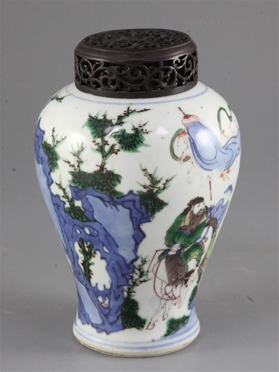 A Chinese wucai baluster vase, 17th century, height 17cm, later wood cover